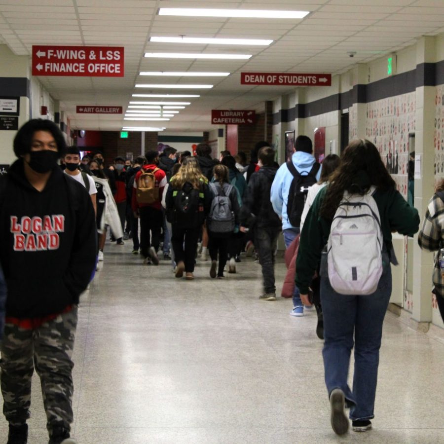 Students walk to class during passing period. 