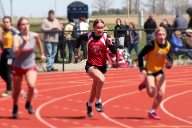 (Above) Pictured is probably one of the most exciting races in track, the 100m dash. Here, senior Arlene Frutos kicks into gear and is rewarded with a podium position at Oak Hill.