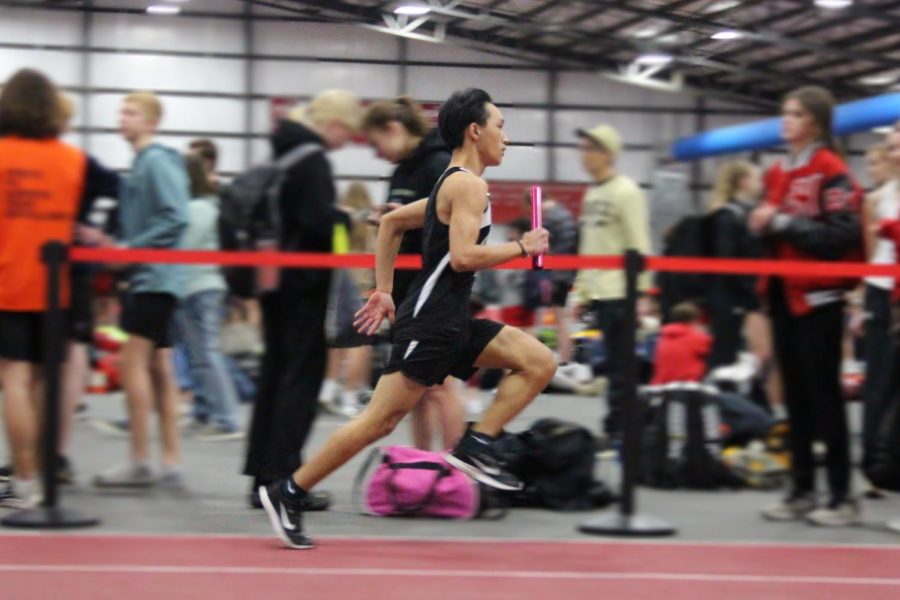 (Above) Sophomore Vasan Nomany running the 4x400. In this race, a team of four will each run two laps around the track and trade off the baton when they are done with their lap. 
