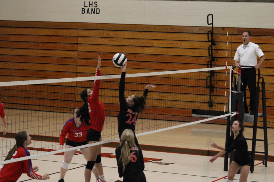 Tipping the ball over the net, senior Berlyn Huff tries to score against Knox. Volleyball had games against Knox and Marion last week. They didn’t win either. Against Knox, freshman Teagan Wolf had nine digs, seven kills, one block, and one ace.