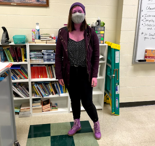 Senior Delia Penn painted herself purple to represent seniors on Class Color Competition Day.