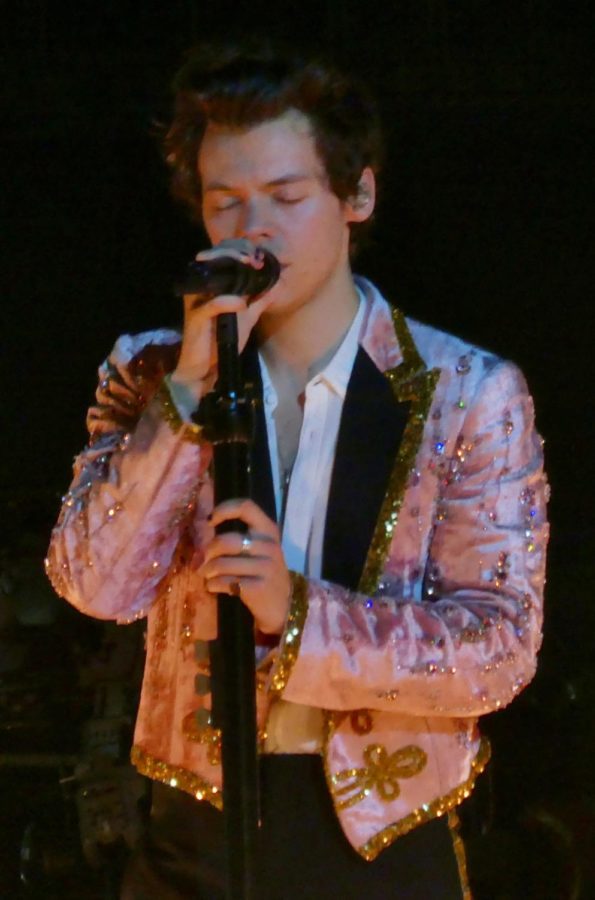 Styles can be seen singing some of his hits Matilda and Boyfriends on his album Harrys House. Styles at times can be seen as serious when he sings about past experiences with love. 
