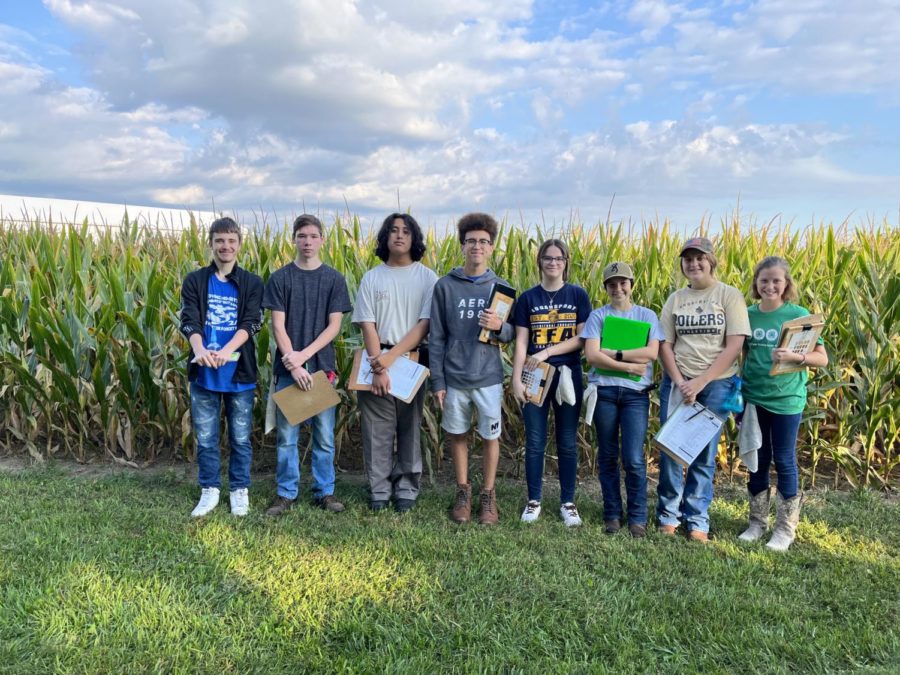 FFA students smile as they get ready for their soil compeition on September 17th. Soil judging is identifying different types of soil. I had a really great time for my first soil competition, Im really looking forward to more in the future, junior Omar Ruiz said. 