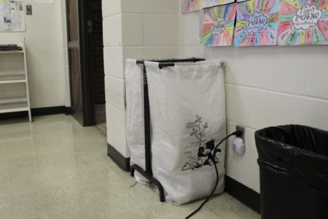 These bags sit in classrooms to collect paper materials for recycling. The Safe Club  came up with the school-wide paper recycling program in order to help the schools environment. They plan on coming up with more ways  to make the school as clean and safe as possible.