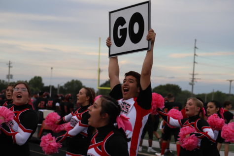 During a football game, junior Ivy Padilla shouts in excitement with the rest of the cheerleaders. 
He looks so happy. Hes the loudest person on the cheer team, junior Gretchen Prifogle said. Thats why he totally has the spirit in this picture.