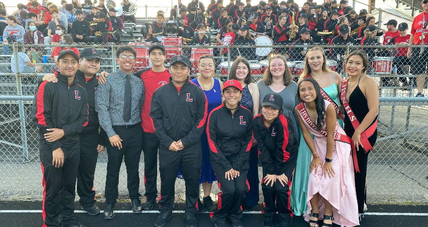 Homecoming night with the senior band students. Drum majors pictured are Lorena Alvarez, Sasia Linden, Brayan Escobedo, and Jadyn Alford.     