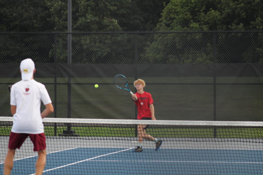Junior+Peyton+Zimmerman+competes+in+a+singles+match+against+McCutcheon.