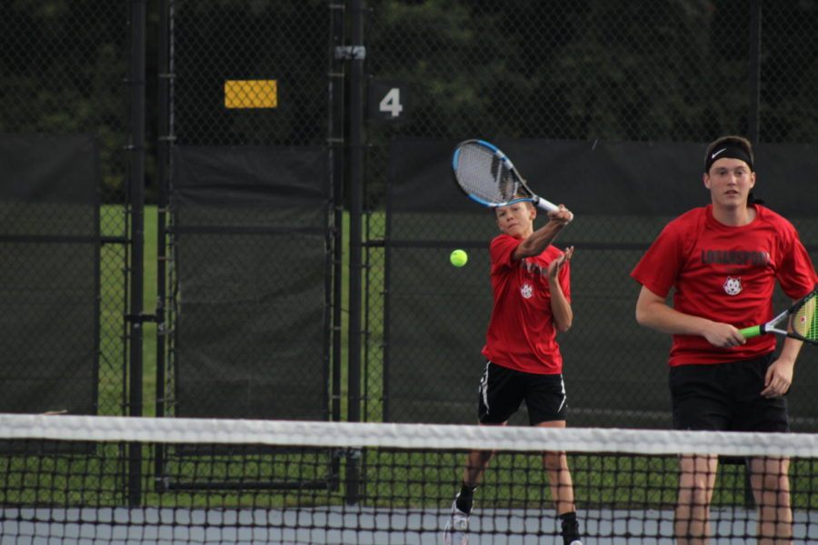 In the Logansport vs. McCutcheon tennis match, sophomore Aiden Swank and sophomore Max Kitchell compete in a doubles match. 