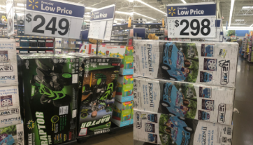 These cars for children were significantly different in price for essentially the same thing. The Frozen car on the right is $49 more than the car on the left. 