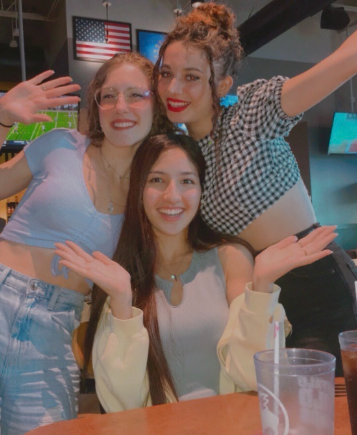 Junior foreign exchange students Chiara Bosisio, Bassma El-Zoubi, and Mariarita Cucci after eating at Buffalo Wild Wings.