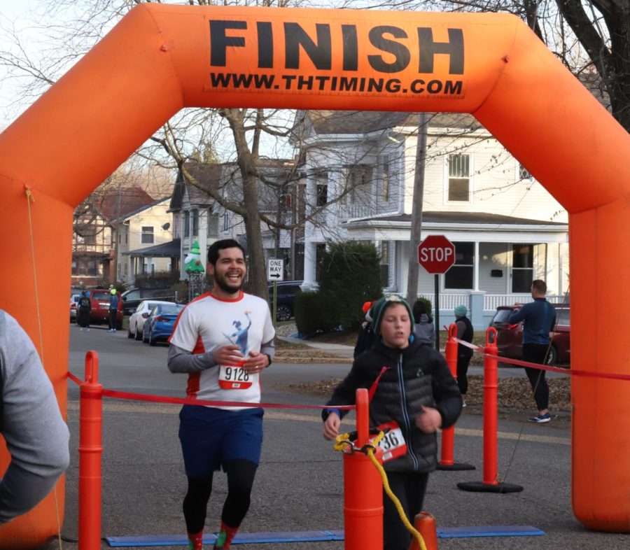 A Spanish teacher at LHS, Andres Valencia finishes his four miles at the Turkey Trot, clocking in at 33:24.