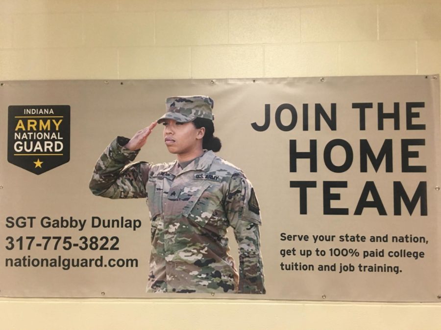 Many posters like this one are posted around the school to generate student interest in joining the military.