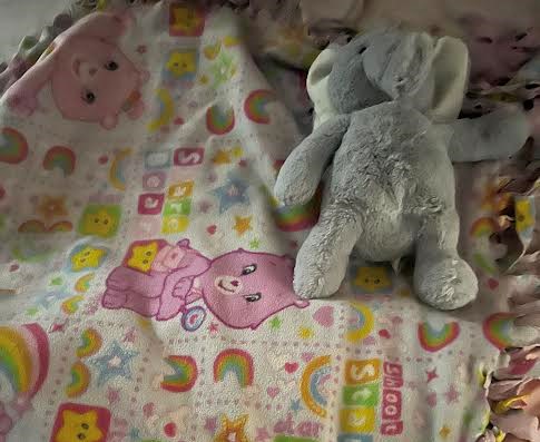 This blanket is the only thing of Jones’s to survive the fire. Shortly after, a teacher gave her the stuffed elephant.