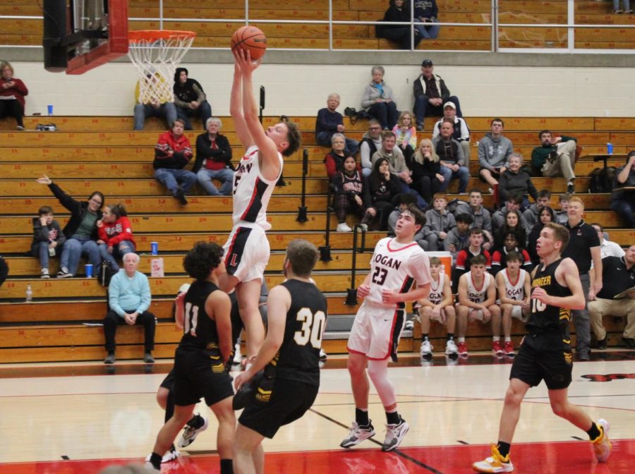 During the Berries games against Pioneer, Junior Jacob  Taylor goes up for the shot.