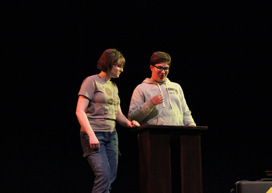 Deal or No Deal, Christopher Marty, played by junior Elijah Bault, picks from different briefcases holding various, priceless Logansport relics. The host, sophomore Ava Martin, explains the rules and prizes that are pulled out. 