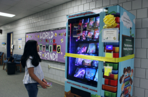 Almost half an hour until the ribbon cutting of the vending machine, fourth grader Clara Caudillo stops and gazes at all the books it contains. On Feb. 13, students and staff got the chance to see the vending machine in all its entirety. The machine has been at Landis Elementary for a couple of weeks, and students have been on the edge of their seats wanting to know how the machine works and how to use it. “We ordered our machine in November, and it was brought to Logansport right before Christmas break,” Long said. “This was definitely a process and took several different people to make this happen. We are so grateful for them. Ellen and I are especially grateful for our administration, who supported our idea and did everything they could to make this idea a reality.” 
