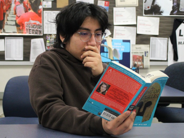 Reading The Song of Achilles by Madeline Miller, sophomore Ared Ruiz shows an interest in reading the book. When people are bored, reading can be one of the many things they can do. There are many genres that people can dive into like sci-fi, nonfiction, historical fiction, etc.