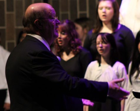 Behind the closed doors of McHale, choir director Timothy Cahalan has the choir sing several songs beforehand. This corrects mistakes and lets the choir practice what they will perform onstage.