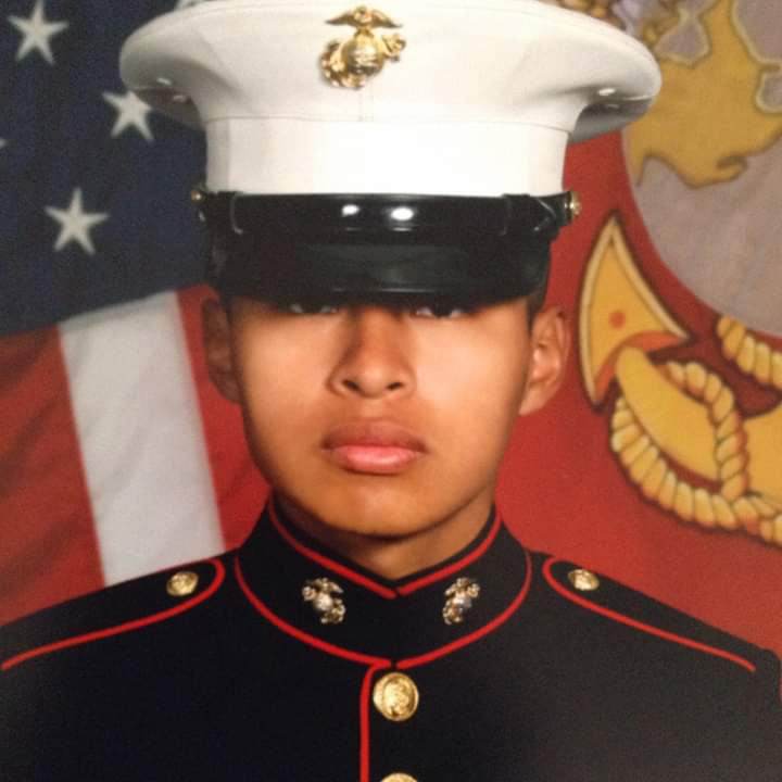 Alumni Jesus Vicente Martin poses for his official Marine Corps portrait.