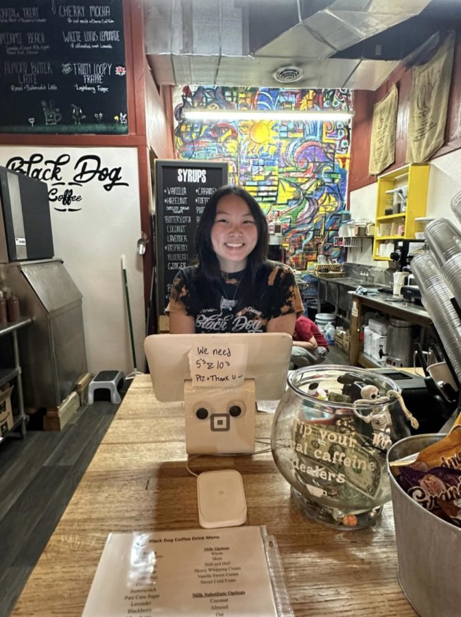 LHS+graduate%2C+Karissa+Hettinger%2C+spends+her+time+at+the+Black+Dog+Coffee+shop+making+and+serving+coffee+to+people+in+the+community.+Working+at+the+shop+has+allowed+her+to+see+how+local+businesses+grow+in+a+community.+Hettinger+has+been+working+at+the+shop+for+three+years+now.+