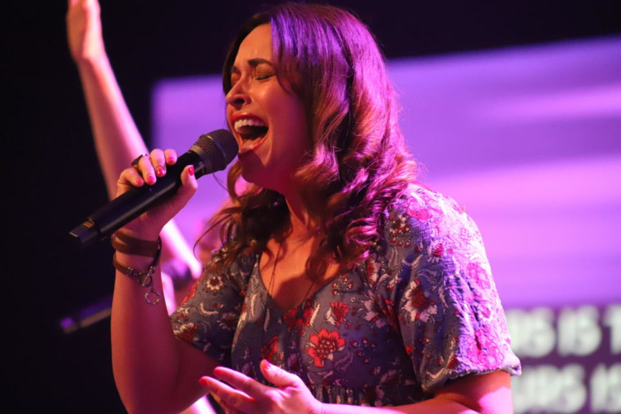 English teacher Grace Scott sings angelically at Revolution Church. Scott created her band back in 2017. Her and the band members met through their church. They have been performing ever since. 