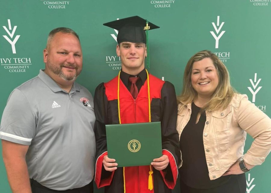 Matt Gaumer, Jeremiah Miller, and Julie Gaumer pose for a photo at Millers Ivy Tech graduation. Miller received both an Academic Honors Diploma from Logansport High School and Associates Degree in General Studies from Ivy Tech.