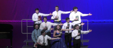 Tony Awards performers finish their opening number and introduce Drama Club director Tony Kinney.