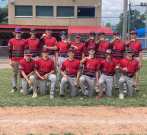 The Logansport Lookouts celebrate after winning the Firecracker Classic in Noblesville.