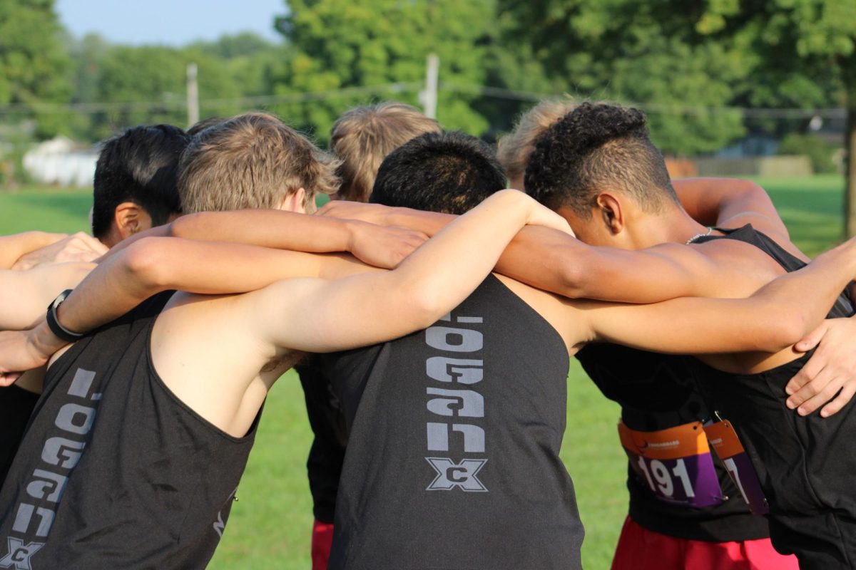 As they prepare to race, the boys huddle up as a team.