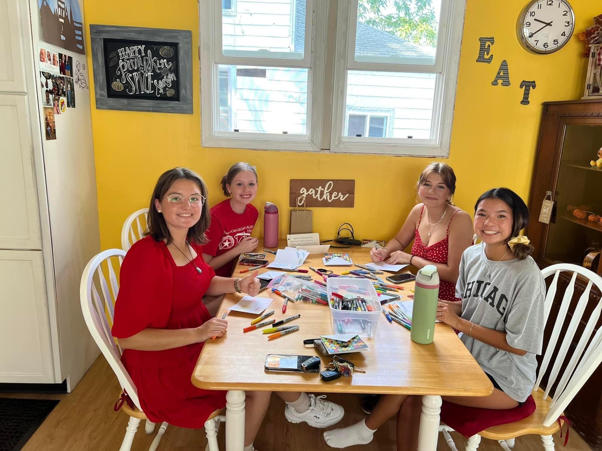 For Septembers service project, Sub Debs write letters to give to residents at a local nursing home. When writing, small groups, also known as color groups, got together as a bonding activity. 