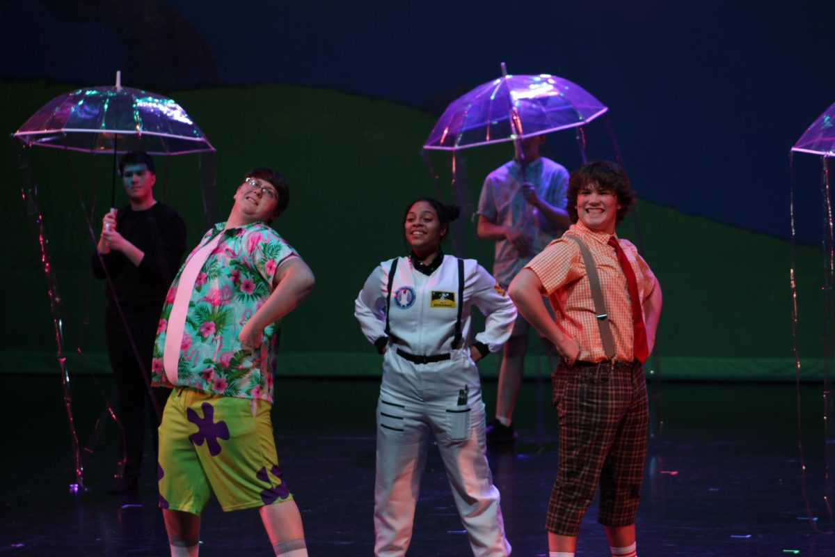 The main trio of the show sings “Hero Is My Middle Name.” Sandy, played by senior Layla Powell; Patrick, played by senior Payton Mucker; and Fultz were the three protagonists of the musical, climbing to the top of Mt. Humongous to stop it from erupting.