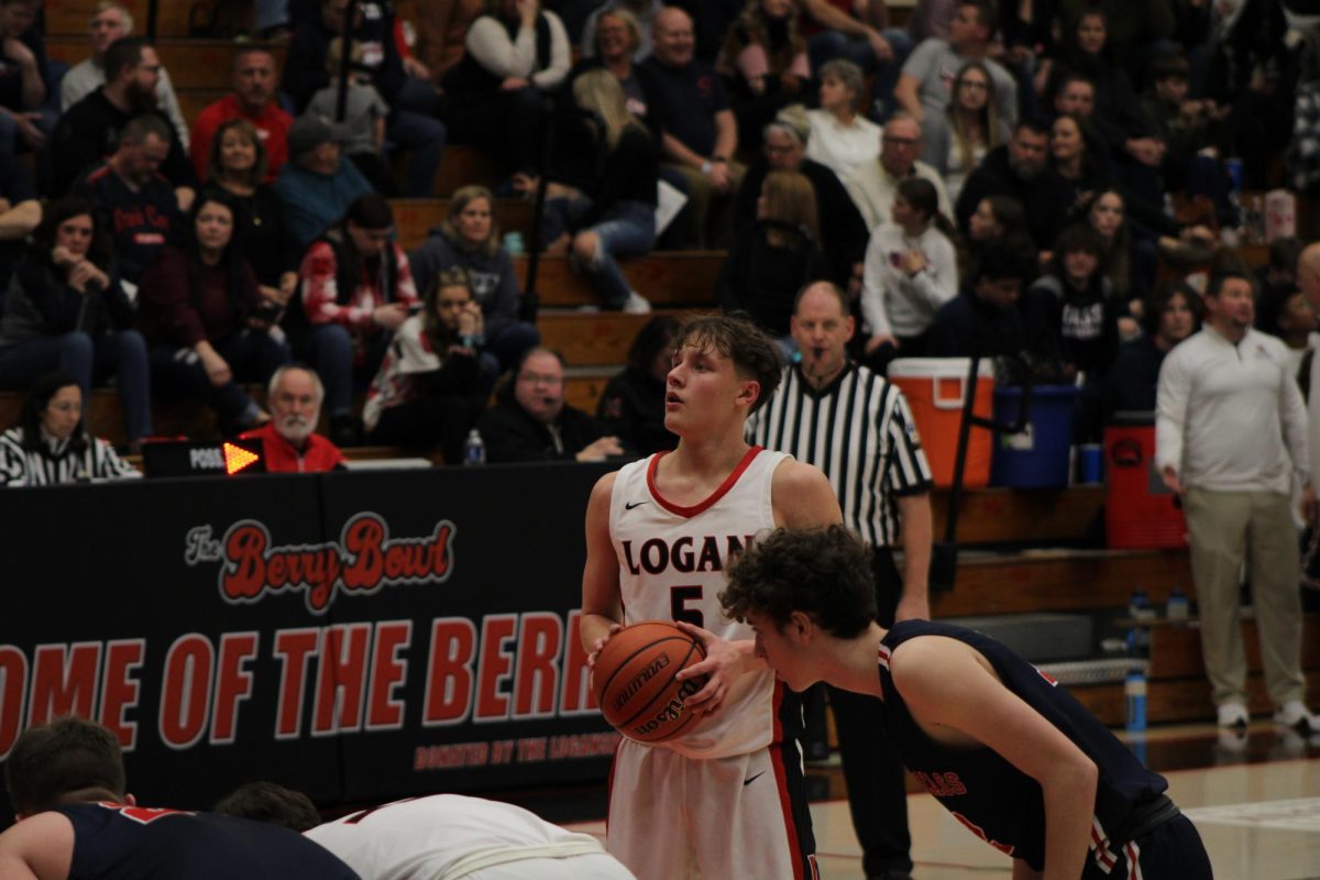 Taking a deep breath, senior Jacob Taylor gets ready before shooting a free throw. 
