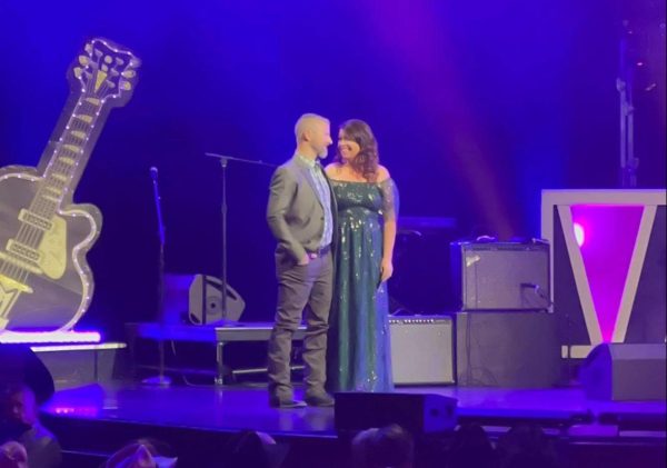 Grace Scott and her husband Wes Scott accept the Traditional Country Music Song of the Year Co-Writer award at the Josie Music Awards. 