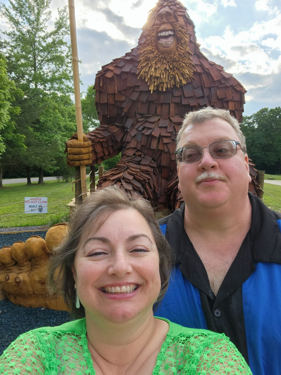 Posing next to a 50 foot tall statue of Bigfoot, Lana Swanson and her husband Jim celebrate his birthday on Patoka Lake.
