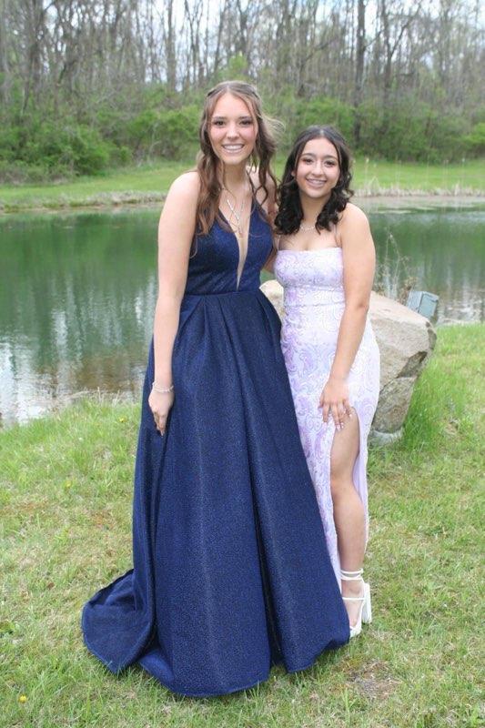 Emily Sanchez and her best friend Senior Kylee Langley get their picture taken by a pond on prom night before they went to grab a bite to eat and dance their feet off. 