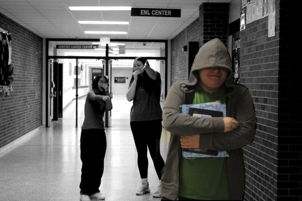 Walking through the halls with his head down, sophomore Jackson Lythgoe heads towards his next class while being bullied by his peers. Many people who have committed suicide might have been bullied to that point, as bullying is one of the main contributors to considering/attempting/committing suicide.