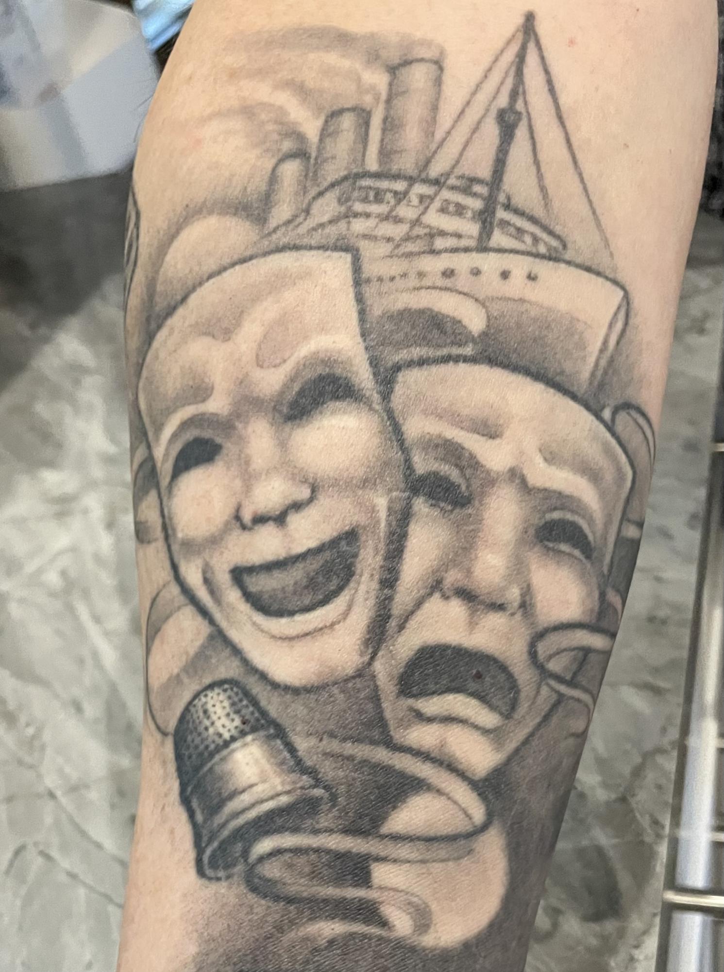 Theatre teacher Tony Kinneys first tattoo features the comedy and drama theatre masks along with a passenger ship and thimble. The ship represents Anything Goes, the first musical he directed for LHS while the thimble represents the musical Peter Pan, which he directed for Logansport Junior Civic Theatre.
