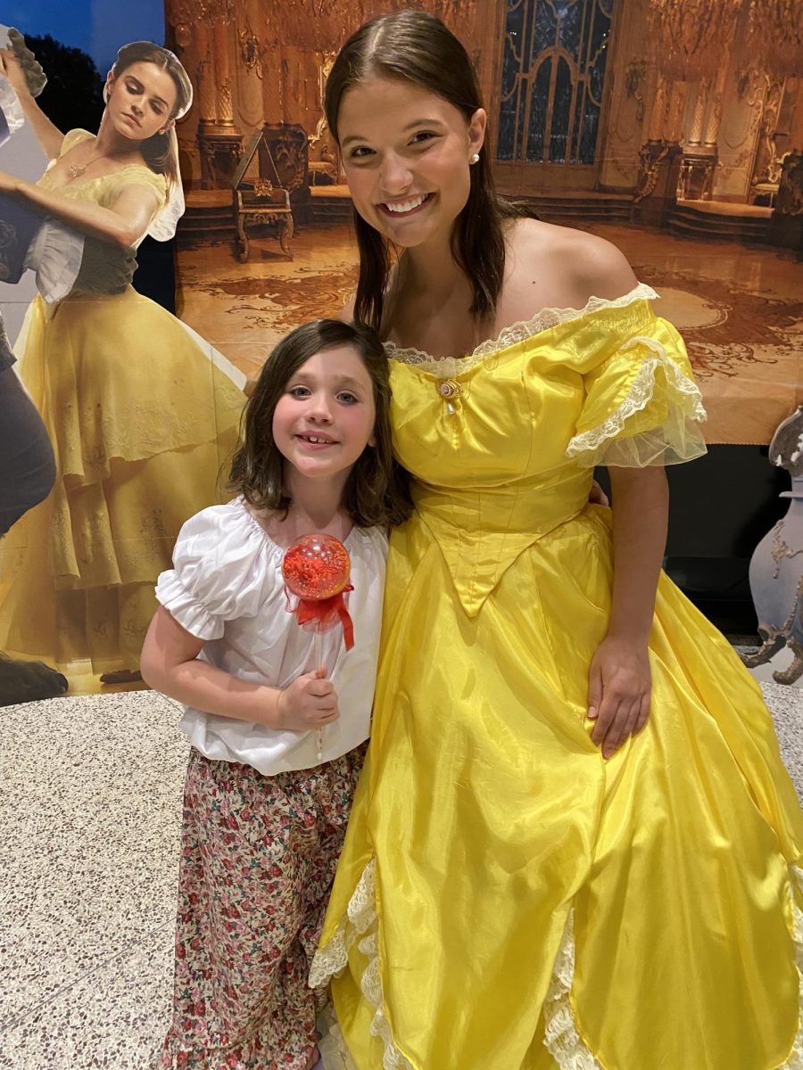 LHS Graduated Maggie Fincher poses with a fan and fellow Beauty in the Beast castmate. Fincher played Bell in the summer 2022 JCT production.