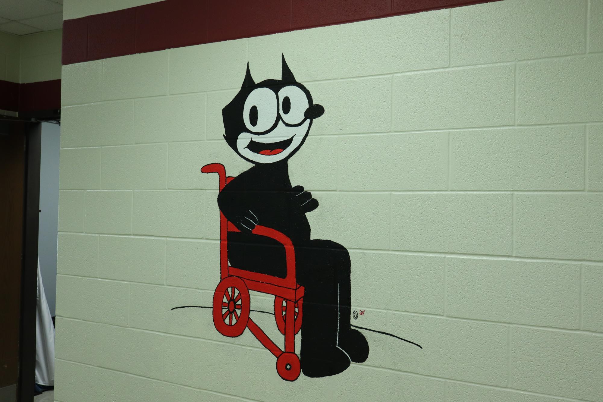 This new mural is one of three in the Special Education hallway. All are meant to give special needs students more representation.