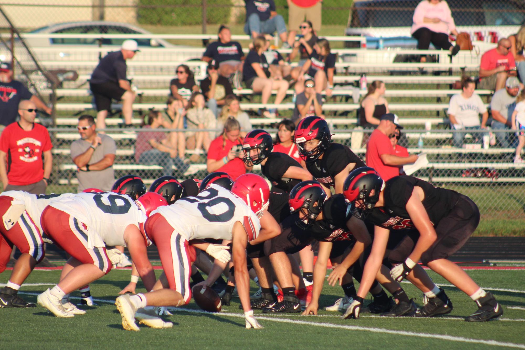 The trenches are set for battle as junior QB Bryson Herr gets under center.