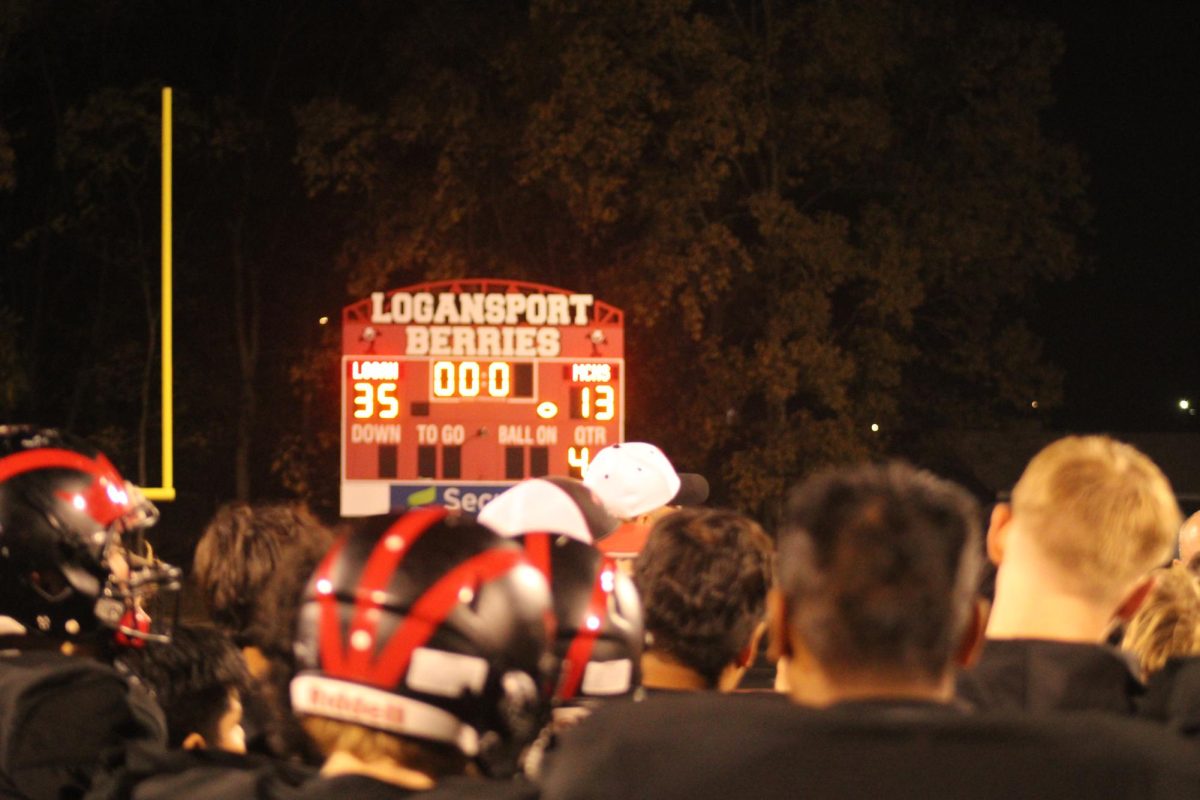 The team in the post game meeting after a win against Muncie Central.