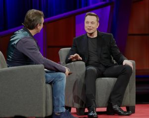 Elon Musk talks to a host at TED about his achievements and goals. (Steve Jurvetson from Menlo Park, USA, CC BY 2.0 , via Wikimedia Commons)