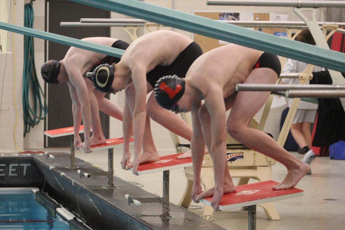 The Logansport boys swim team competes against Delphi last season.