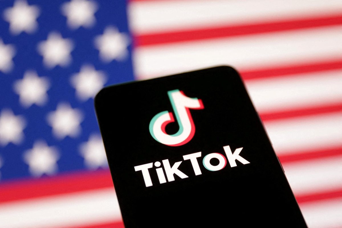 U.S. flag and TikTok logo are seen in this illustration taken January 8, 2025. REUTERS/Dado Ruvic/Illustration
