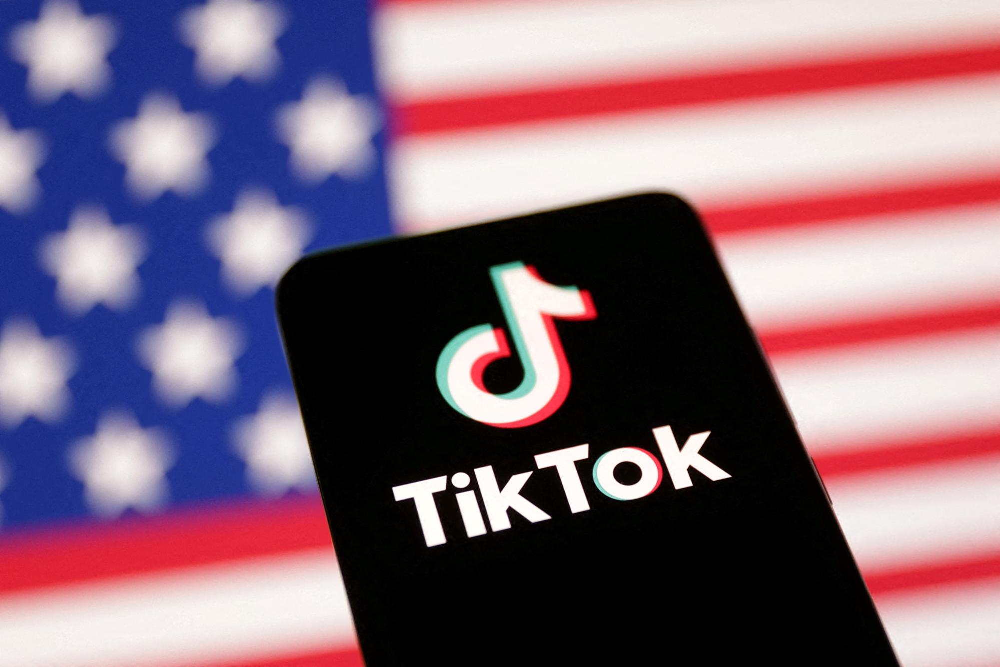 U.S. flag and TikTok logo are seen in this illustration taken January 8, 2025. REUTERS/Dado Ruvic/Illustration