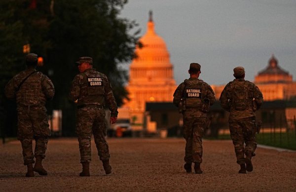Members of the National Guard walk down the National Mall weeks after U.S. President Donald Trump deployed the National Guard and ordered an increased presence of federal law enforcement in Washington, D.C., U.S., September 4, 2025. REUTERS/Leah Millis