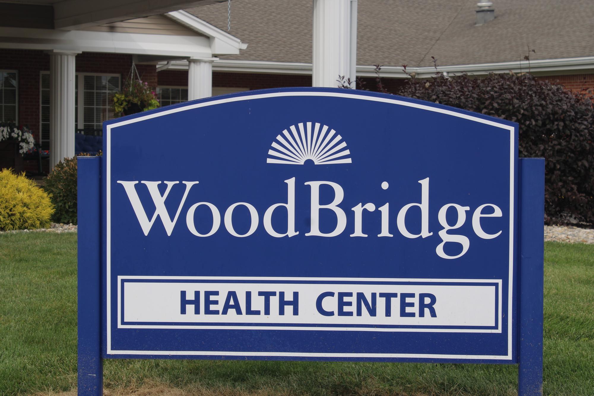 The Woodbridge Health Campus Health Center sign.