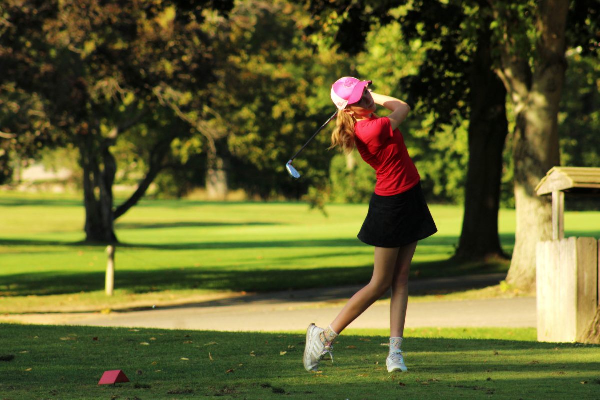 Sophomore golfer Chloe Wilburn tees of on Hole 9 to finish up her performance.