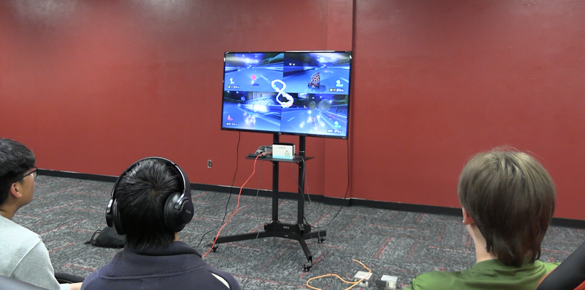 An eSports member plays before the match in ten minutes. Along with other members, it's an expectation to prepare and focus for every match.