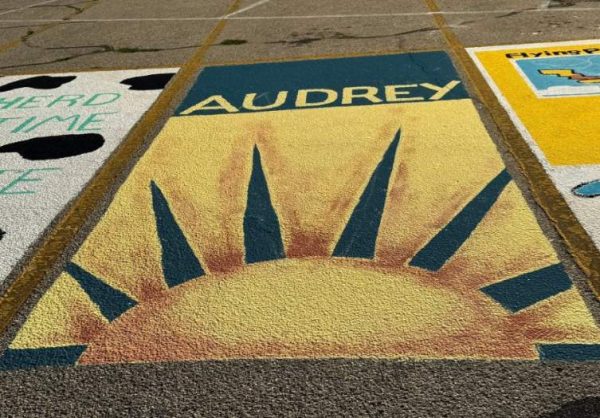 Senior Audrey Graham was inspired by her first-grade teacher when designing her parking spot. "This idea helps me when I am having a bad day and just need to be reminded that what I am struggling with may not be as big as it seems at the moment," Graham said.